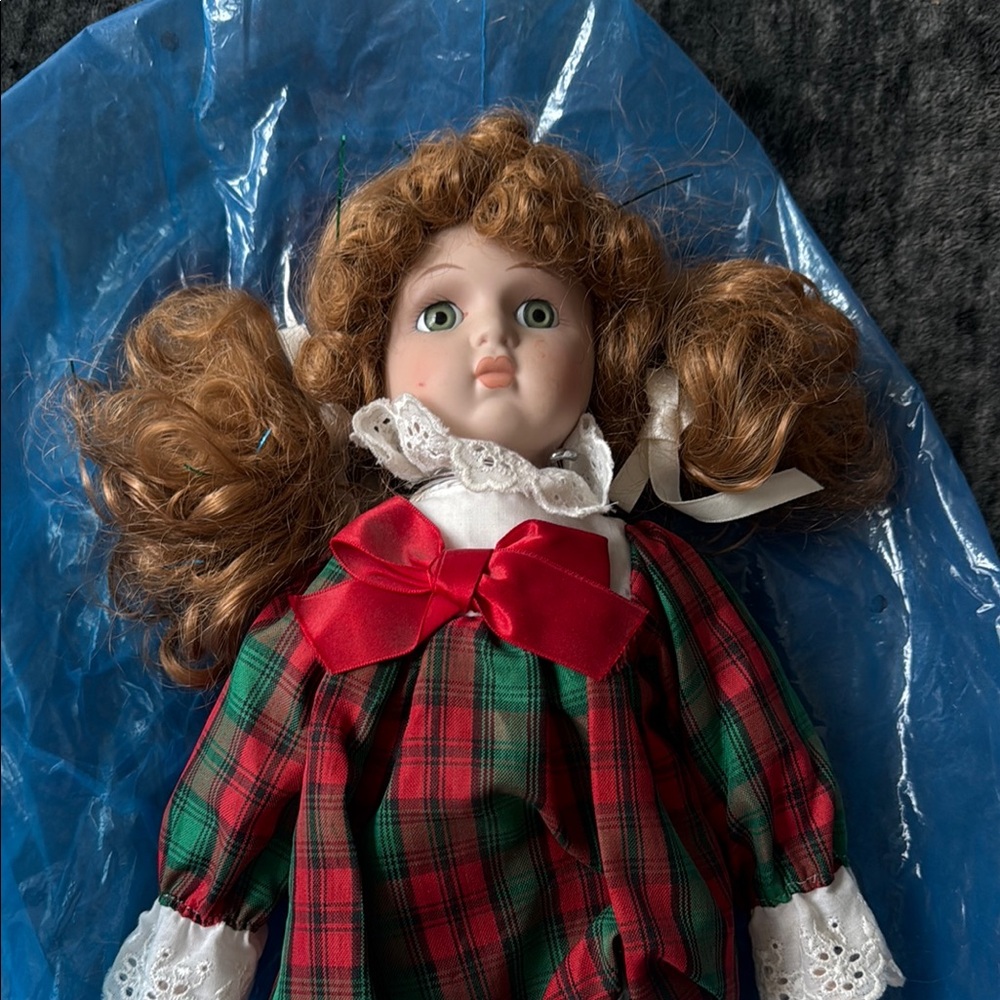 Plaid Porcelain Doll with Red Bow